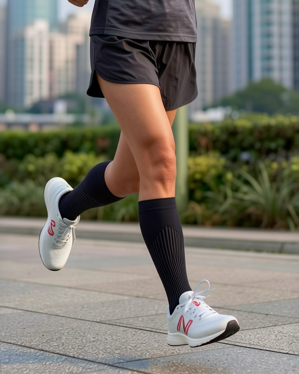 Black sports knee-high compression socks
